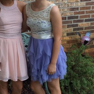 purple dress with a cream lace top